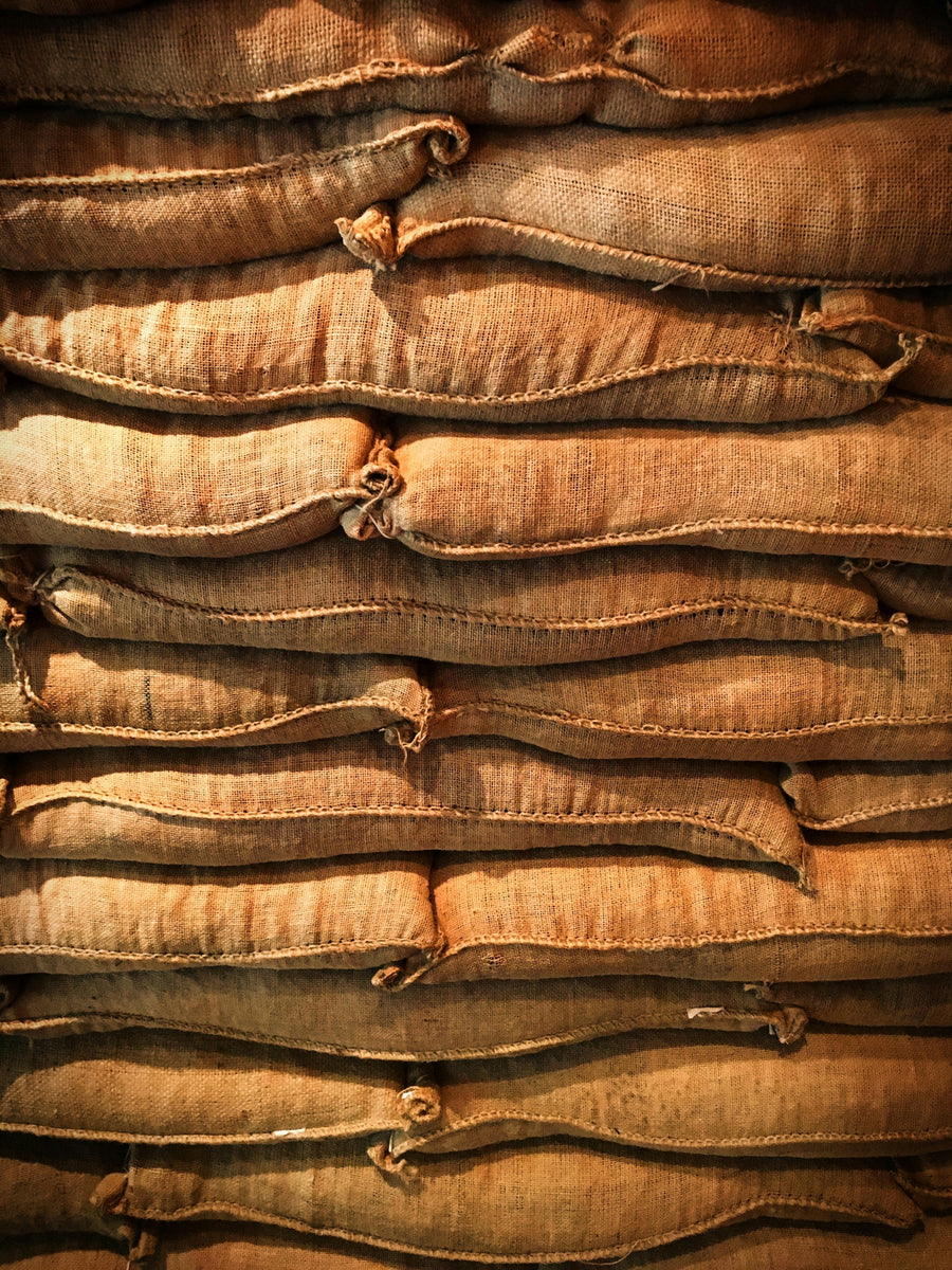 Burlap sacks of green coffee